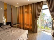 Bán nhà kiểu Vila mini mặt tiền trước sau K112 TRẦN CAO VÂN