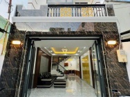 Nhà mới 2 tầng sân thượng Nguyễn Thị Thập  P.Bình Thuận , Q7