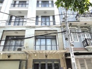 Nhà 4 tầng, xe hơi ngủ trong nhà, vừa ở vừa kinh doanh, cạnh Phú Mỹ